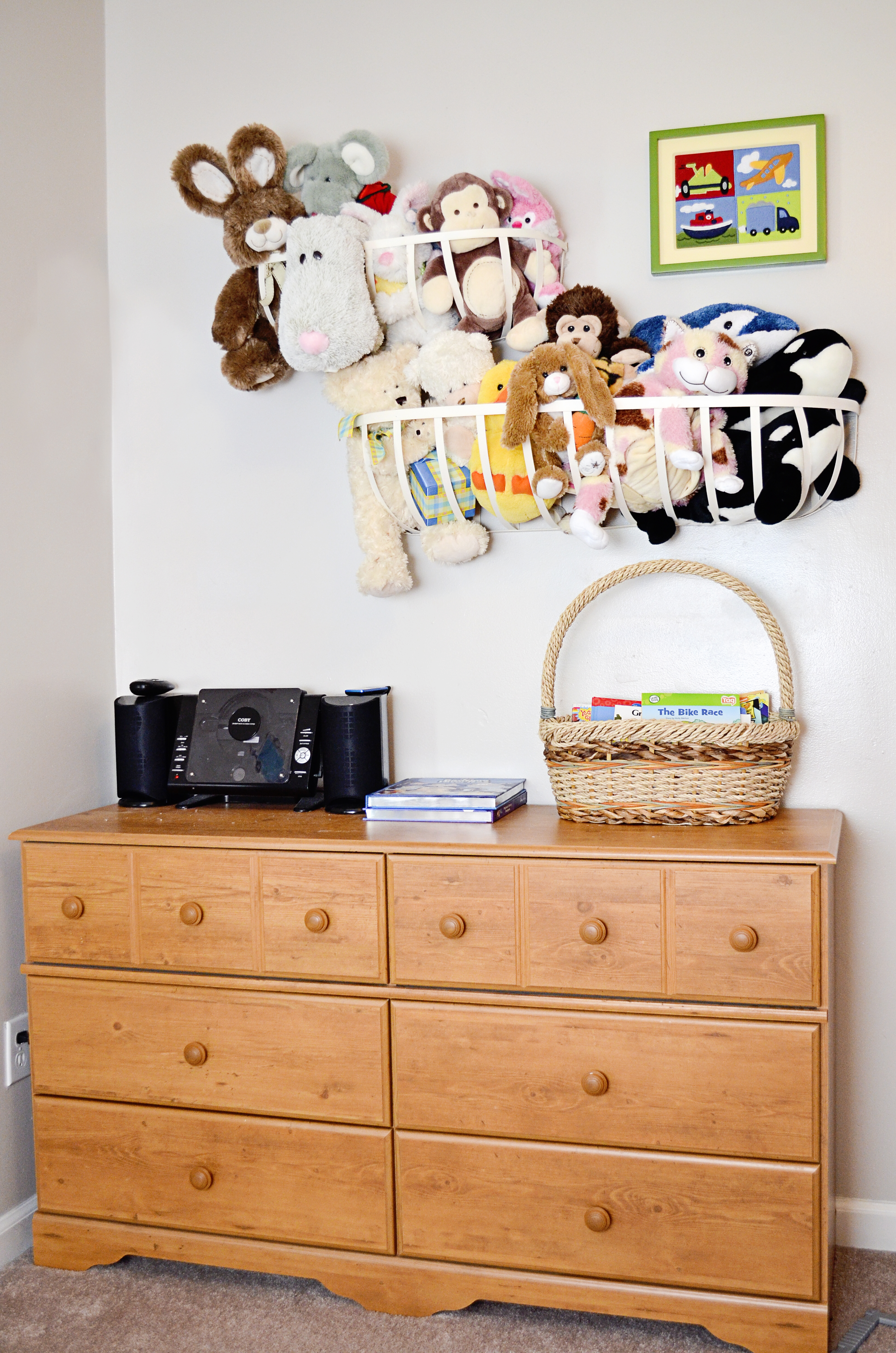 These Stuffed Animal Toy Storage Baskets are a creative and fun way to store your children's stuffed animals. Perfect for small spaces, it gets all of the toys off of beds and the floor.