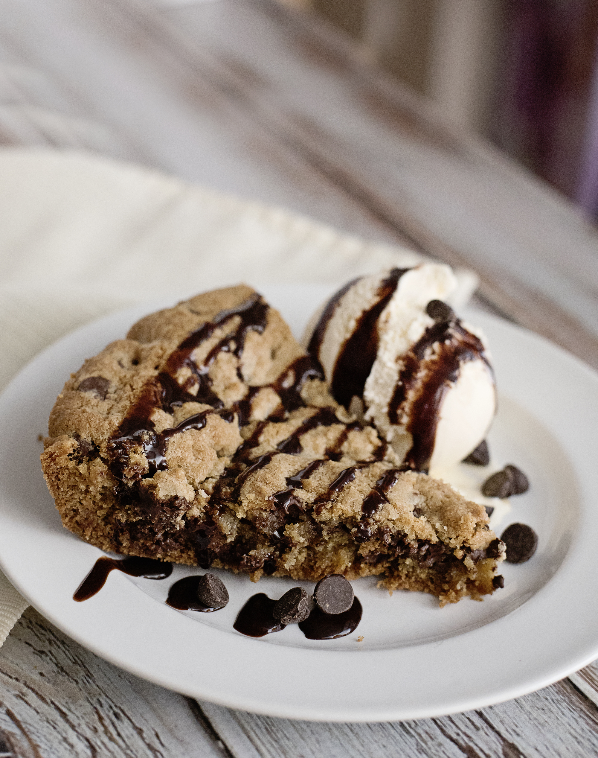 Skillet Cookie Cake - Restaurant Style! This recipe is seriously better than a birthday cake. Moist, delicious and easy to make.